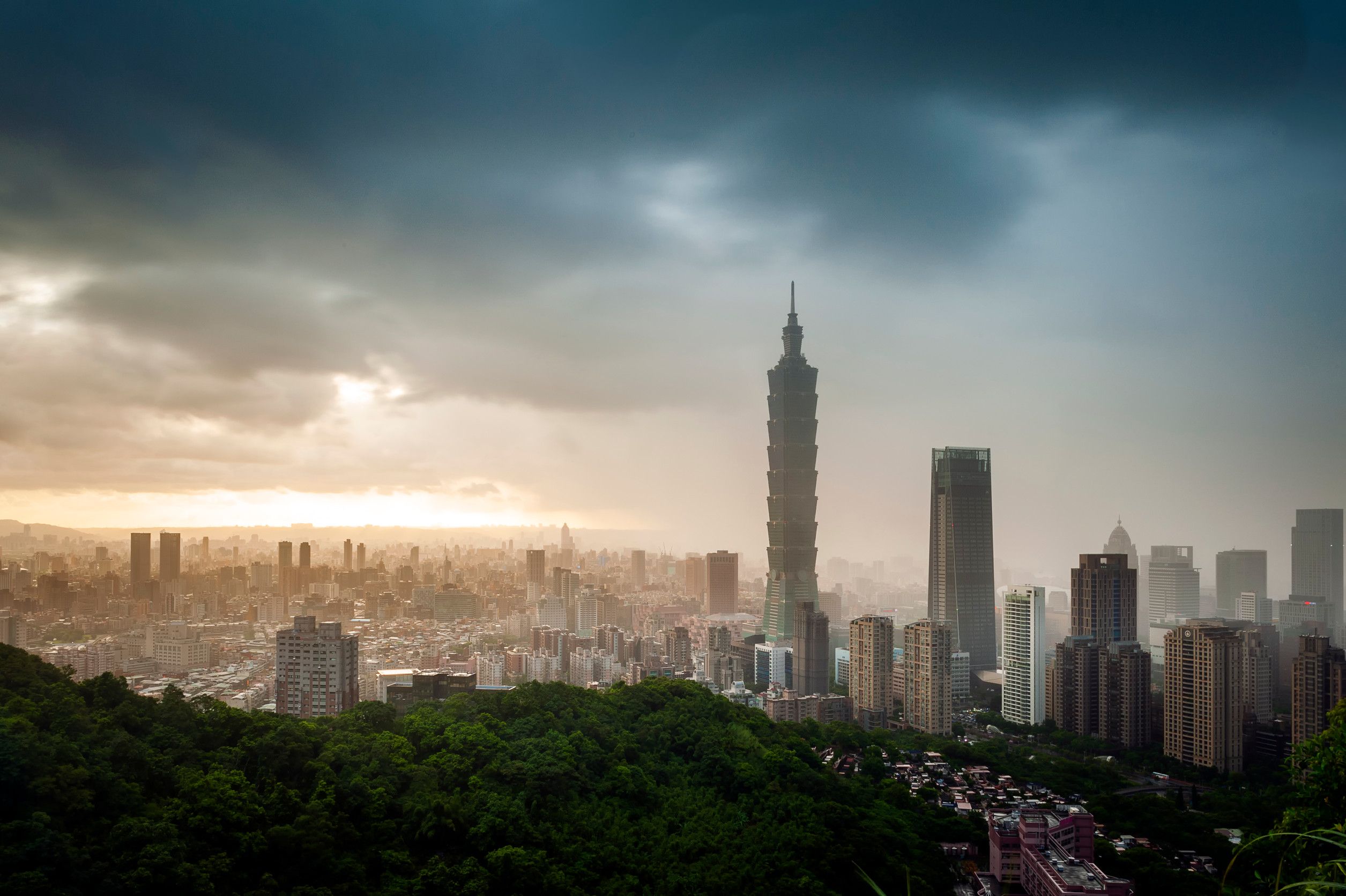 Skyline View Of Taipei Glowing In The Sunset Light